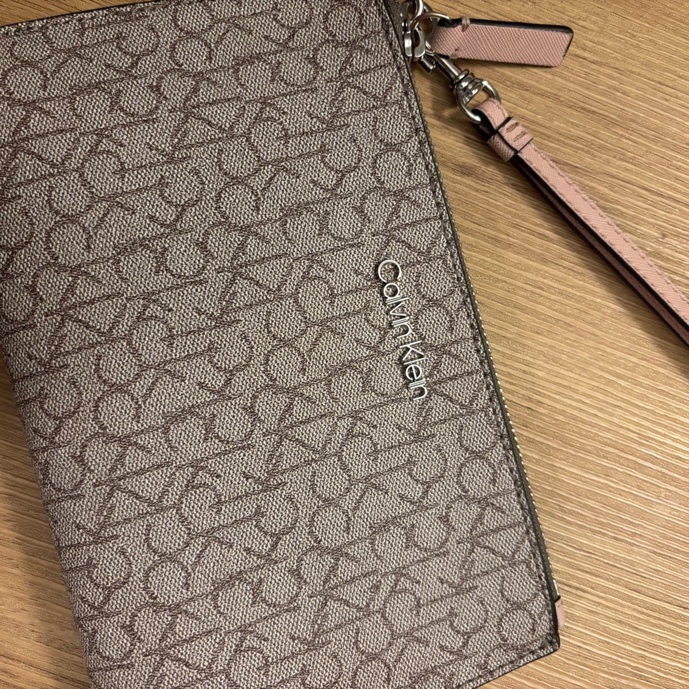 Calvin Klein Taupe Monogram Wristlet with Pink Strap
